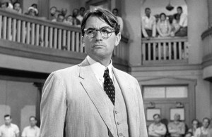 To Kill a Mockingbird character Atticus Finch, played by actor Gregory Peck, argues before a segregated courtroom in Jim Crow Alabama.